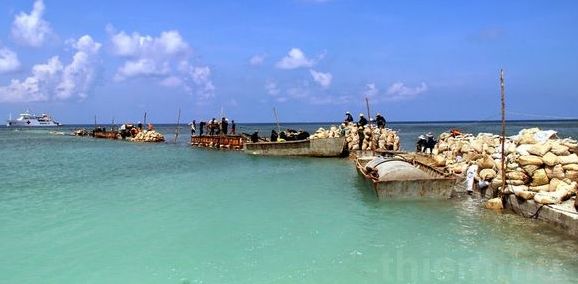 永暑礁长大了,110艘不沉的航空母舰震慑中国南海